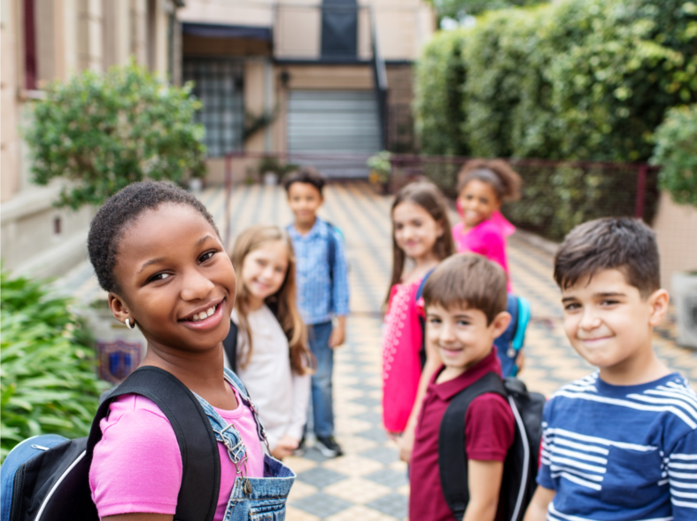 children-waiting-in-line-to-go-back-to-school